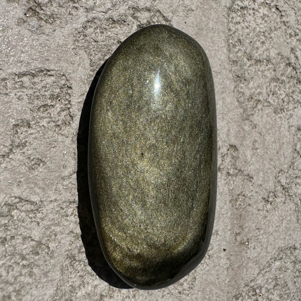Silver sheen obsidian palm stone